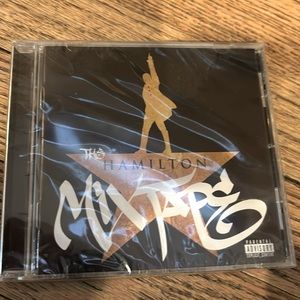 The Hamilton Mixtape CD still wrapped in plastic
